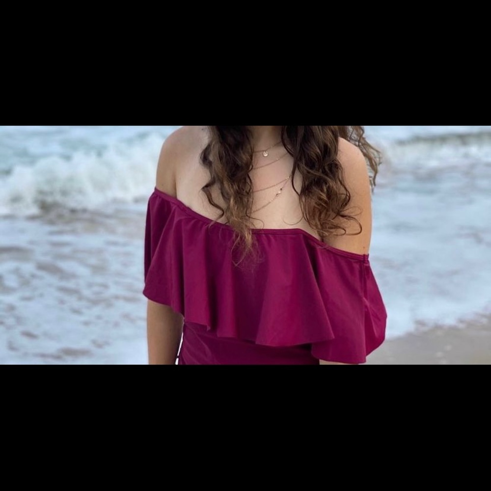 Cute off the shoulder one piece. Worn once